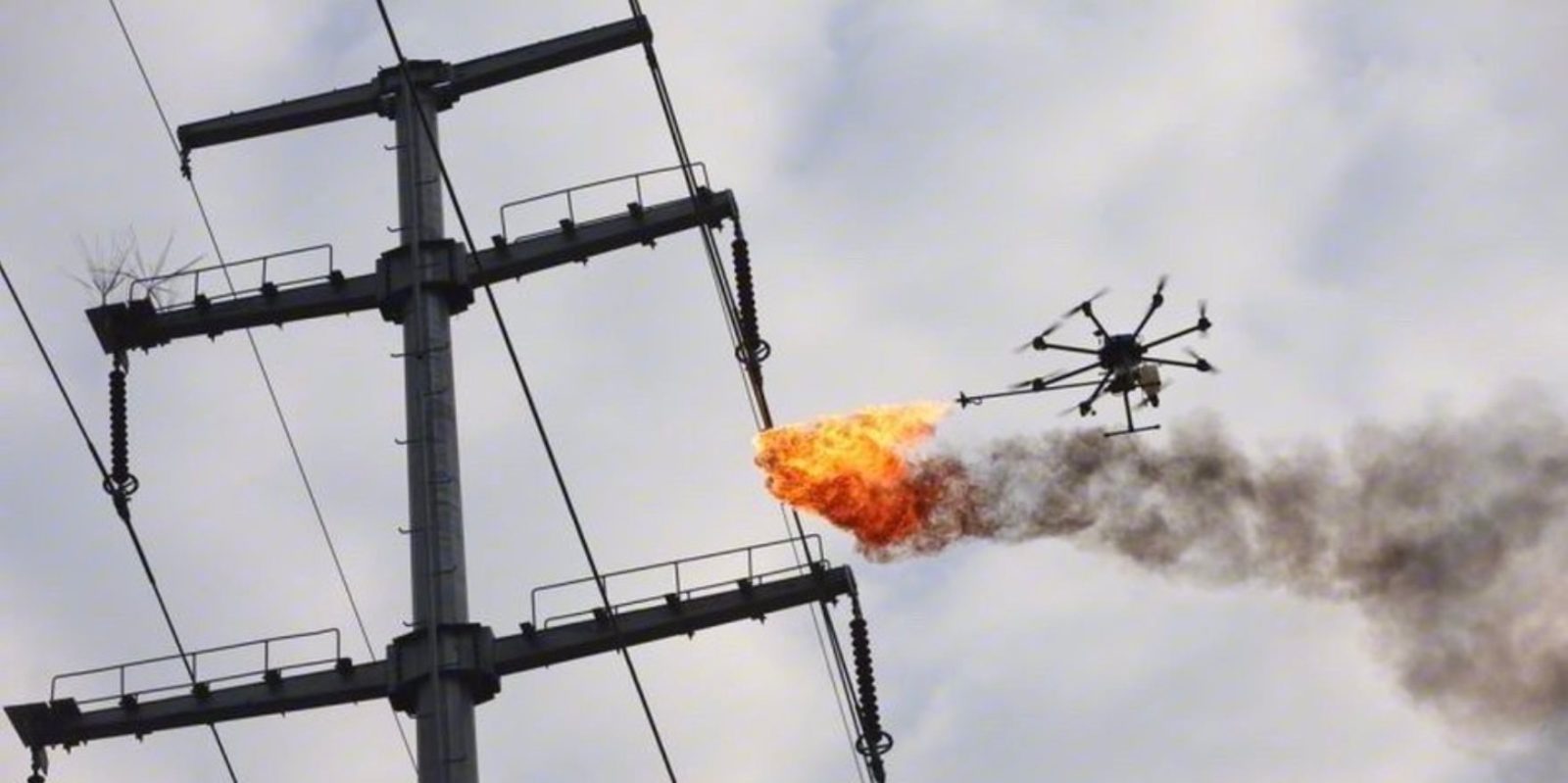 Cleaning power lines is easy when you have a flame-throwing drone0000
