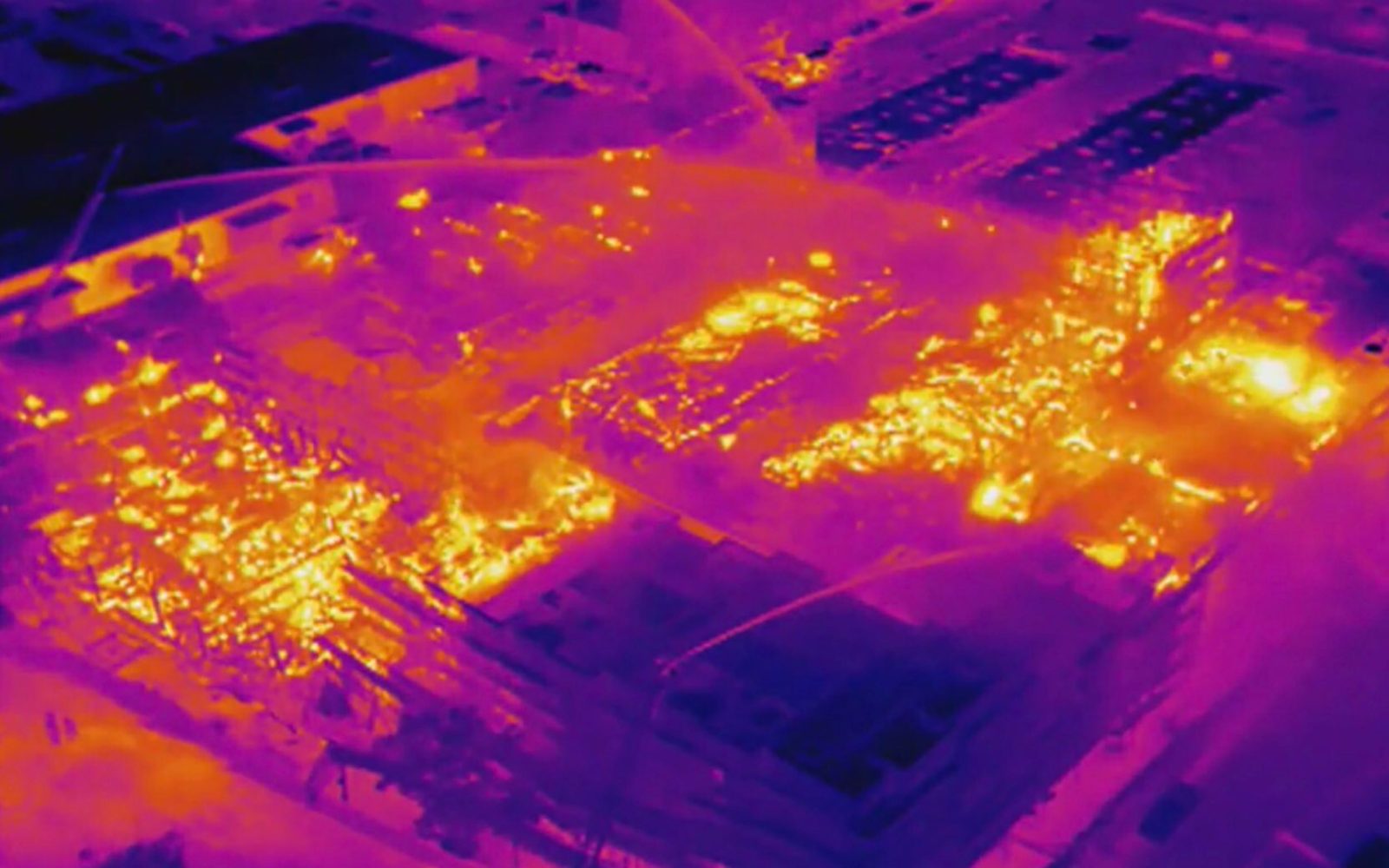 Drone with thermal camera shows hot spots in massive fire in Oakland, Calif.