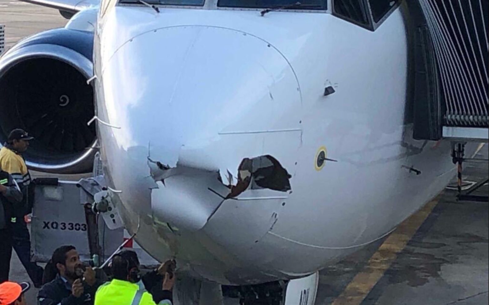 Boeing 737 passenger jet damaged. Possibly hit by drone before landing