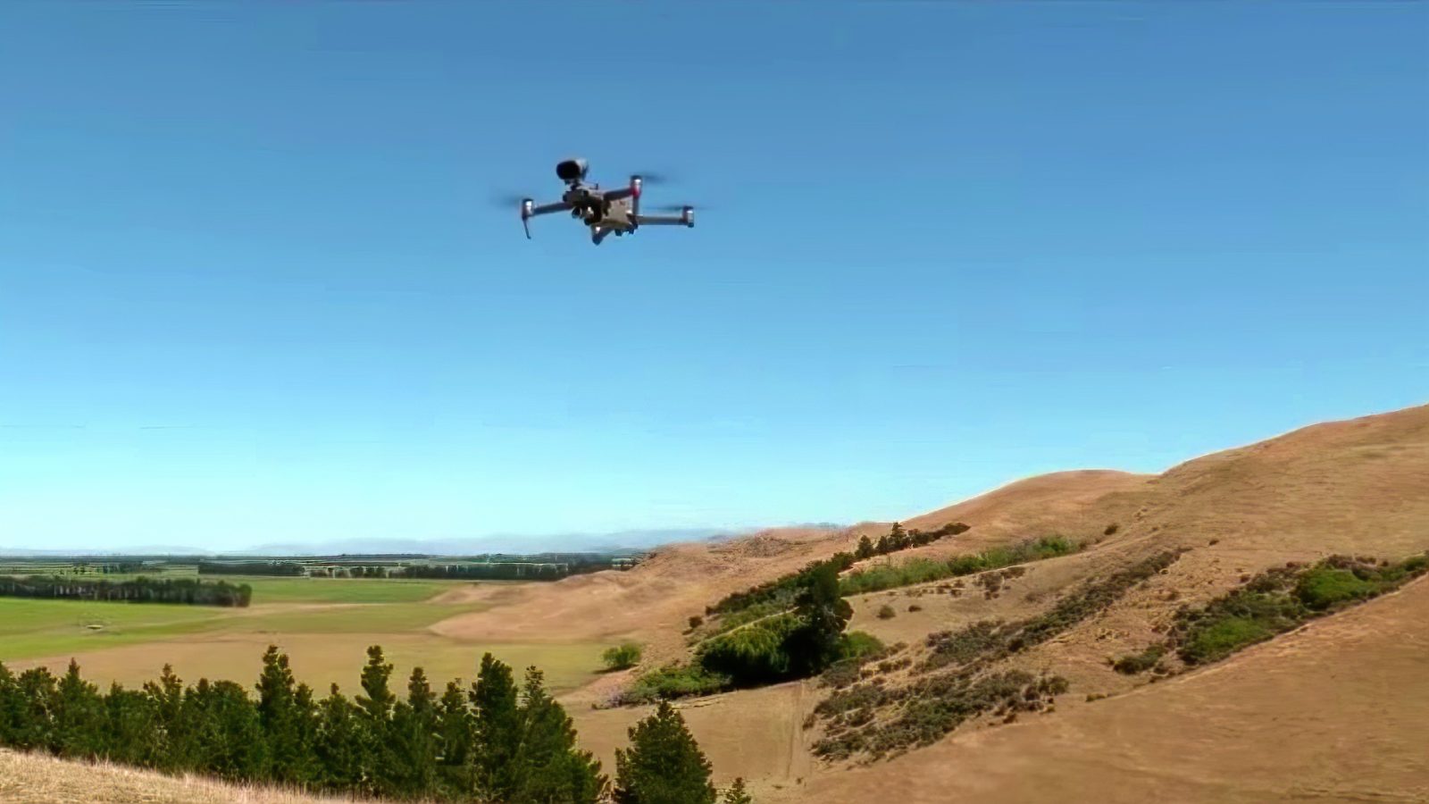 Herding sheep with a drone that barks like a dog