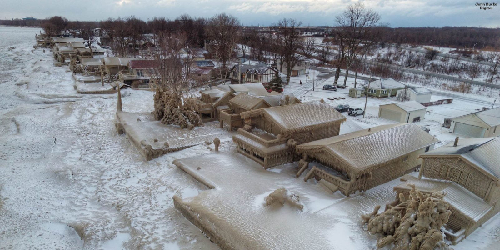 drone footage houses Lake Erie ice